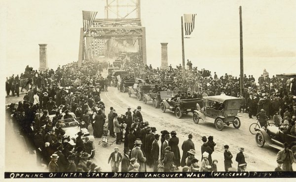 vintage Interstate Bridge with crowds waiting to cross for the first time.