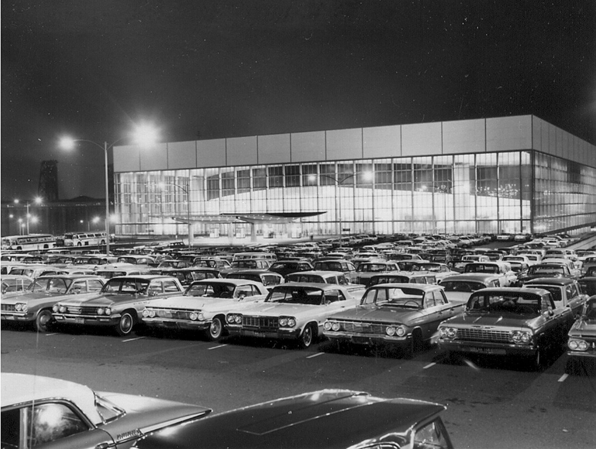 vintage Veteran Memorial Coliseum with full parking lot