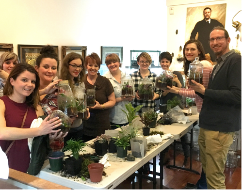 An excited group of terrarium makers