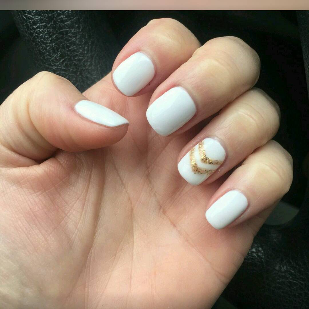 white with gold accent nails