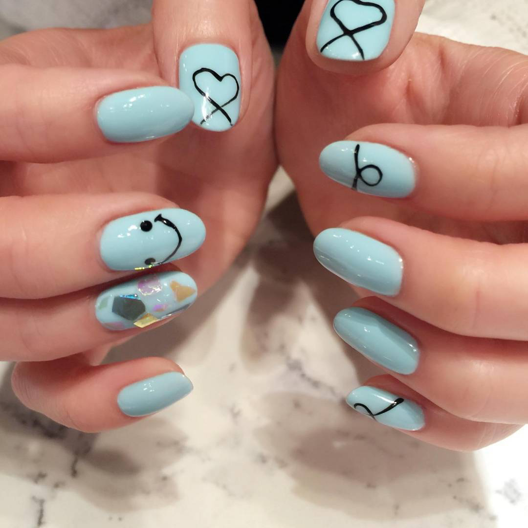 Blue with black accent nails