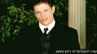 gif of Nick Lachey standing and looking pretty