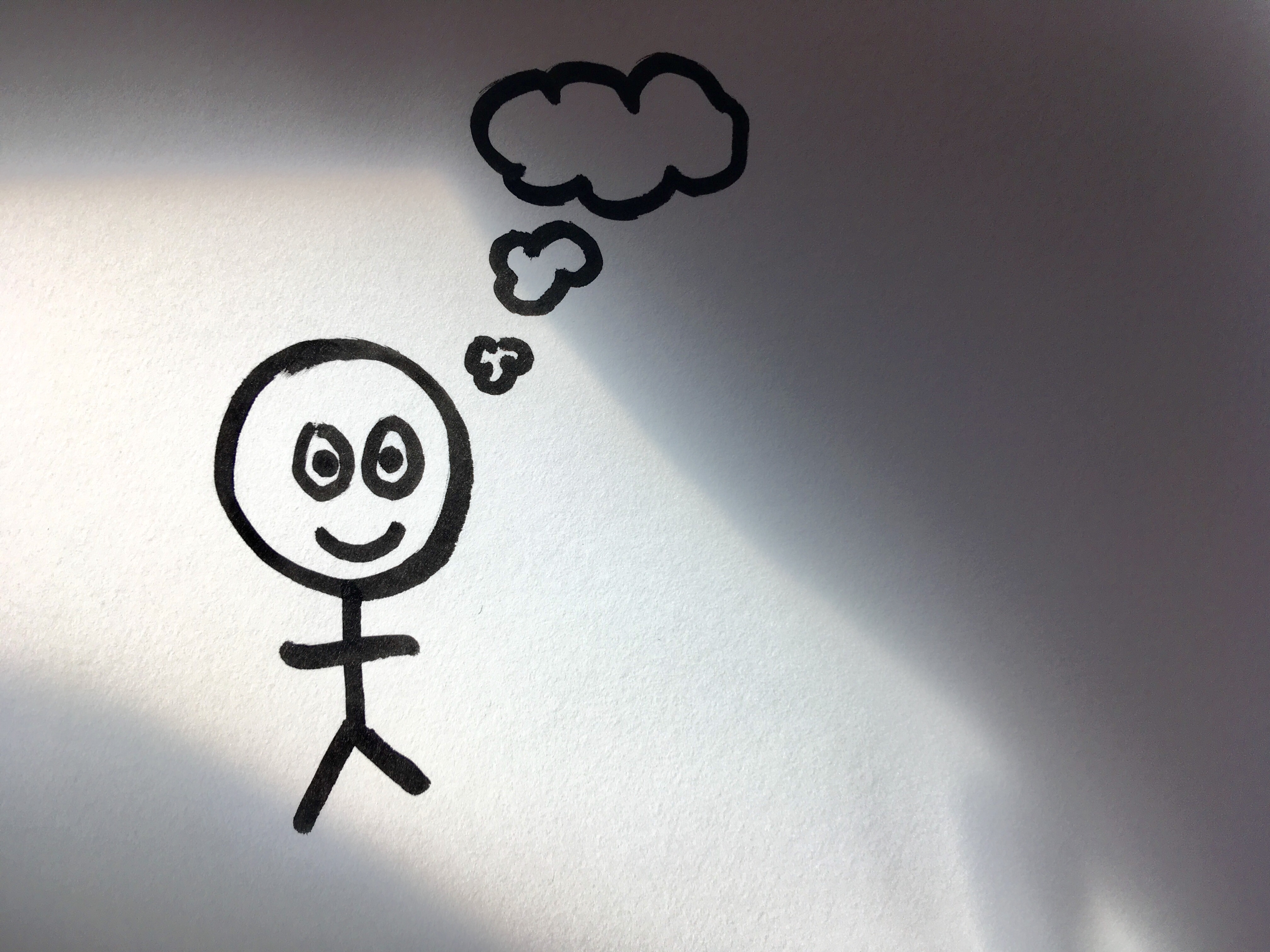 Stick figure with thinking cloud